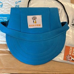 High paw dog hat with adjustable strap in back